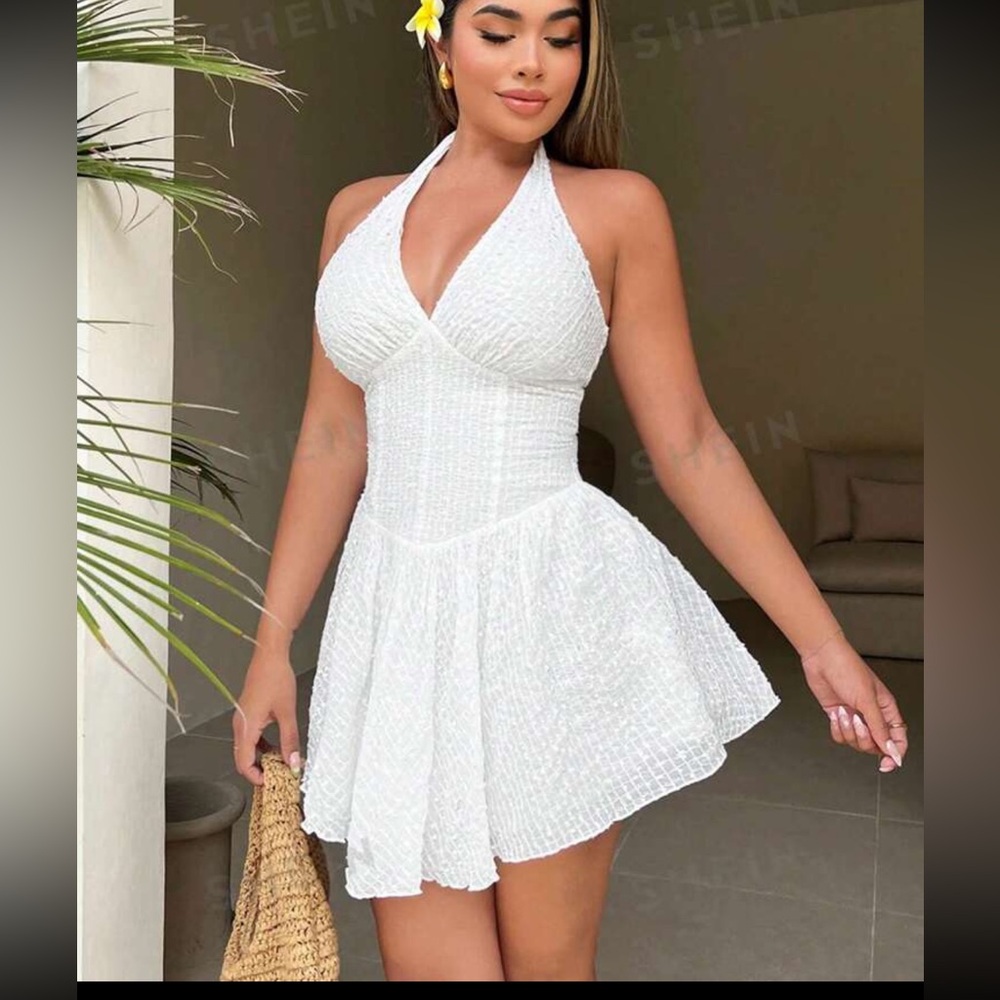 Cute white flowy dress with design